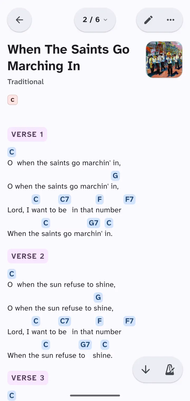 A song open: chords on their own line above the words, and at the bottom right the button that opens the controls.